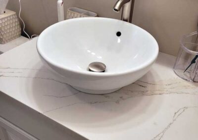 Bathroom sink with above counter bowl installed by Decker Plumbing & Drains