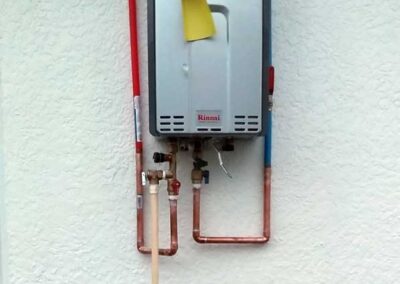 Water heater and pipes installed by Decker Plumbing & Drains